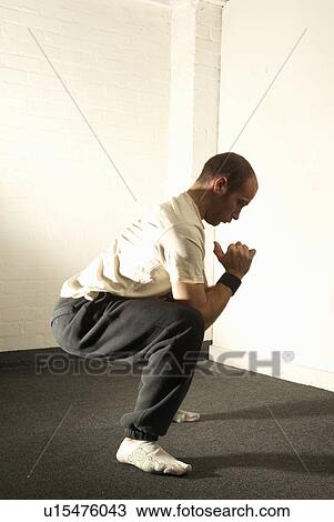 Stock Image - Man doing exercises. Fotosearch