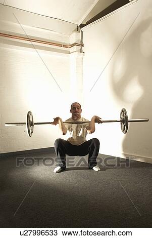 Stock Image - Man doing exercises. Fotosearch