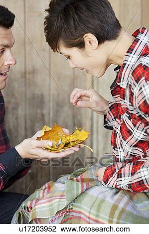 Man giving jewellery gift to woman View Large Photo Image Stock Image - Man giving jewellery gift to woman. Fotosearch