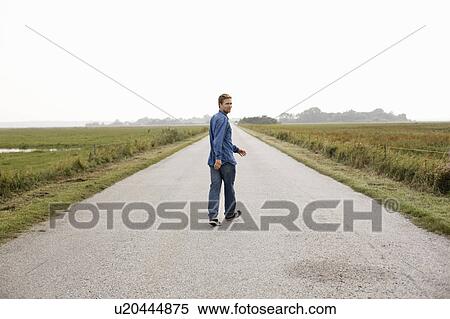 Man on road View Large Photo Image Stock Photography - Man on road. Fotosearch