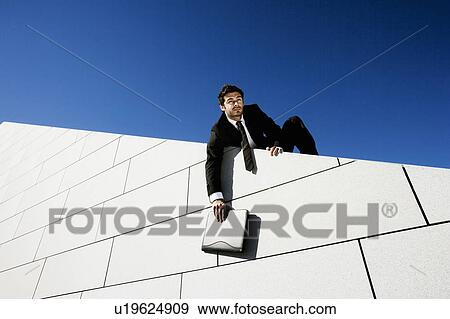 Man on wall View Large Photo Image Stock Photo - Man on wall. Fotosearch