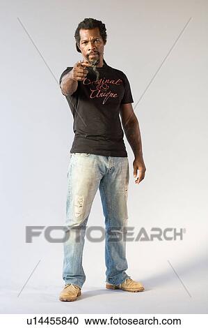 Stock Image - Man pointing at camera. Fotosearch