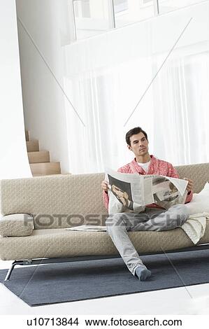 Man reading newspaper View Large Photo Image Picture - Man reading newspaper. Fotosearch