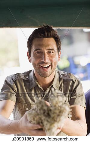 Man selling fruits View Large Photo Image Stock Photo - Man selling fruits. Fotosearch