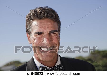 Stock Image - Man smiling. Fotosearch
