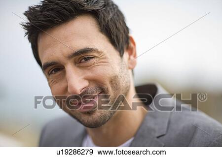 Stock Photo - Man smiling. Fotosearch