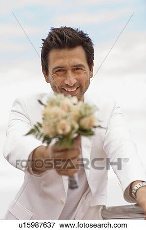 Stock Photo - Man waiting for his bride-to-be. Fotosearch