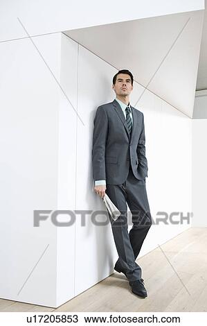 Man waiting with newspaper View Large Photo Image Stock Image - Man waiting with newspaper. Fotosearch