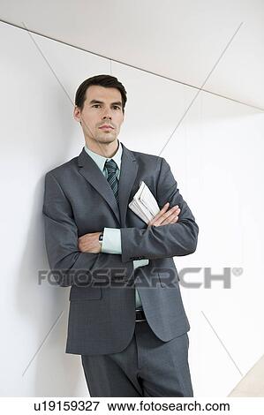 Man waiting with newspaper View Large Photo Image Stock Photo - Man waiting with newspaper. Fotosearch