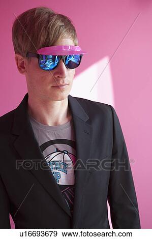 Stock Photo - Man with pink shades. Fotosearch