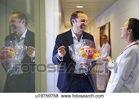 Stock Photo - Man wooing a doctor. Fotosearch
