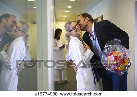 Stock Photo - Man wooing a doctor. Fotosearch