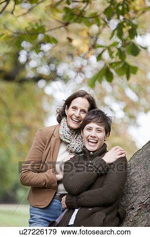 Mother and daughter in the park View Large Photo Image Stock Photo - Mother and daughter in the park. Fotosearch