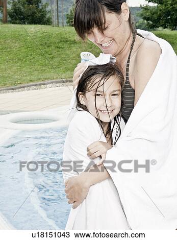 Stock Image - Mother and Daughter in towels. Fotosearch