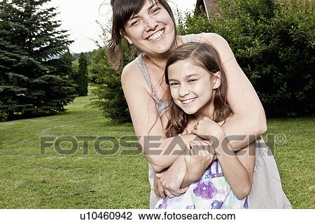 Stock Image - Mother and daughter portrait. Fotosearch