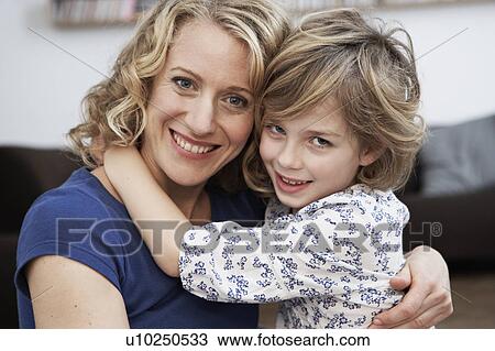 Mother and girl hugging View Large Photo Image Stock Image - Mother and girl hugging. Fotosearch
