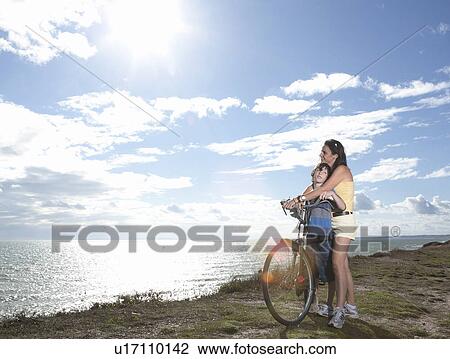 Mother and son embracing View Large Photo Image Stock Image - Mother and son embracing. Fotosearch