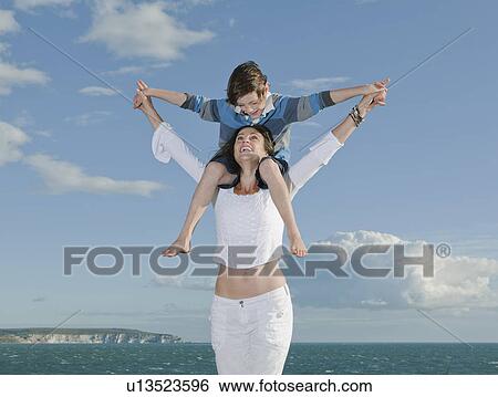 Mother and son View Large Photo Image Stock Photograph - Mother and son. Fotosearch