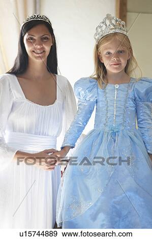 Mother & daughter dressed as princesses View Large Photo Image Stock Photo - Mother & daughter dressed as princesses. Fotosearch