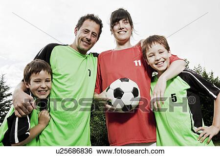 Mother in different team to family View Large Photo Image Stock Photograph - Mother in different team to family. Fotosearch