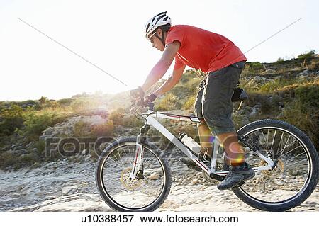 Stock Photo - Mountain Biking. Fotosearch