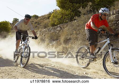 Stock Photograph - Mountain Biking. Fotosearch