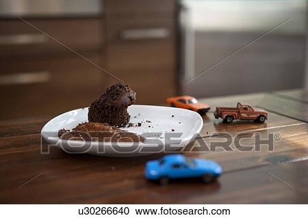 Stock Image - Muffin on a plate. Fotosearch