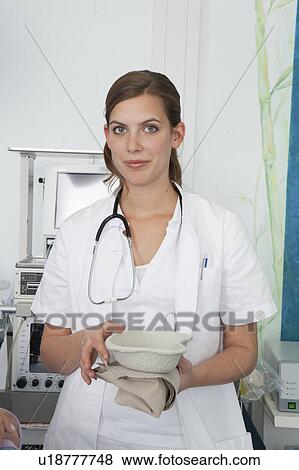 Nurse with set of instruments View Large Photo Image Stock Photo - Nurse with set of instruments. Fotosearch
