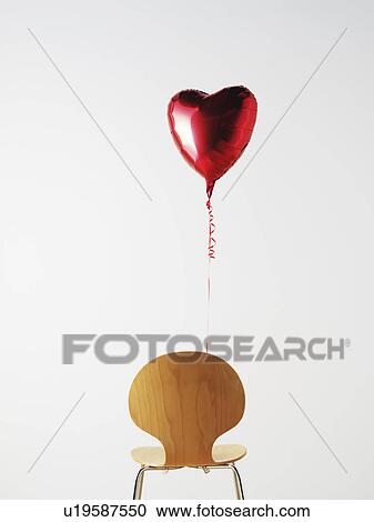 Office Chair and love heart balloon View Large Photo Image Stock Image - Office Chair and love heart balloon. Fotosearch
