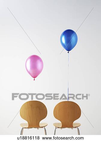 Stock Photo - Office Chairs and balloons. Fotosearch