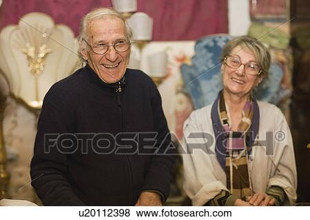 Older couple smiling View Large Photo Image Stock Photo - Older couple smiling. Fotosearch