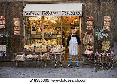 Owner standing in front of deli View Large Photo Image Stock Photography - Owner standing in front of deli. Fotosearch