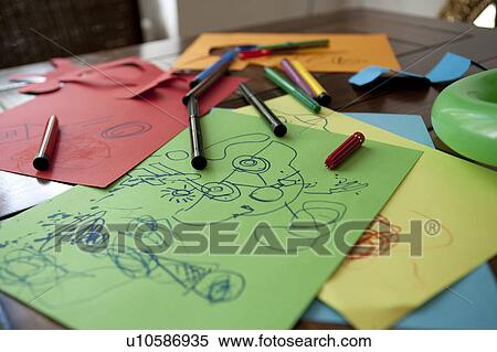 Paper laying on table View Large Photo Image Stock Photography - Paper laying on table. Fotosearch