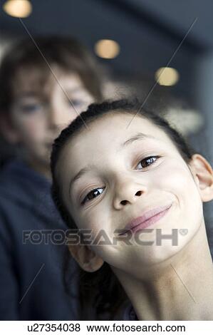 Portrait of 7 years old girl smiling View Large Photo Image Stock Photo - Portrait of 7 years old girl smiling. Fotosearch