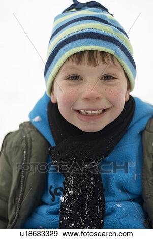 Portrait of boy in snow View Large Photo Image Stock Photo - Portrait of boy in snow. Fotosearch