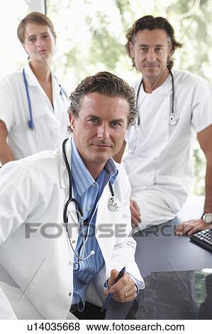 Portrait of doctors and nurse View Large Photo Image Stock Photo - Portrait of doctors and nurse. Fotosearch