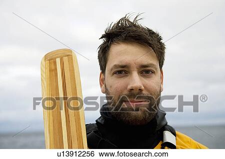 Stock Photograph - Portrait of kayker. Fotosearch