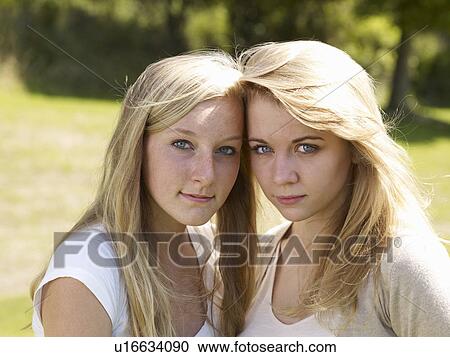 Portrait of two female friends View Large Photo Image Stock Image - Portrait of two female friends. Fotosearch
