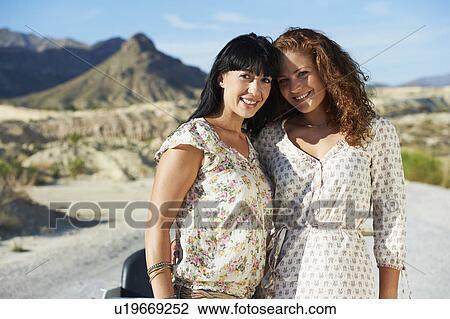 Portrait of two women on the road View Large Photo Image Stock Image - Portrait of two women on the road. Fotosearch