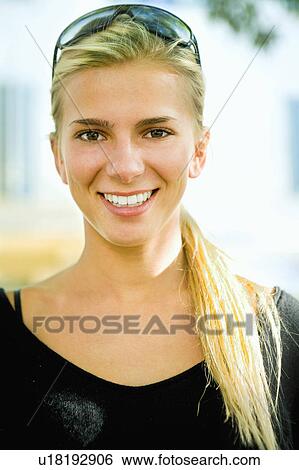 Portrait young woman smiling View Large Photo Image Stock Photograph - Portrait young woman smiling. Fotosearch