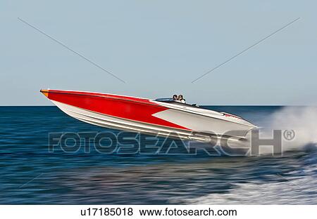 Powerboat racing at high speed View Large Photo Image Stock Photo - Powerboat racing at high speed. Fotosearch