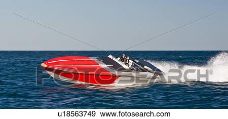 Powerboat racing at high speed View Large Photo Image Stock Photo - Powerboat racing at high speed. Fotosearch