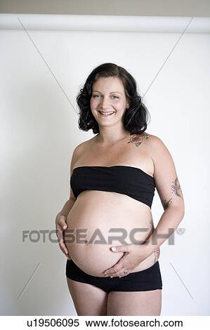 Pregnant woman laughing View Large Photo Image Stock Photography - Pregnant woman laughing. Fotosearch