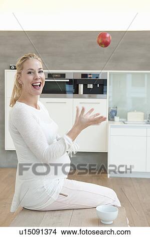 Picture - Pregnant woman. Fotosearch
