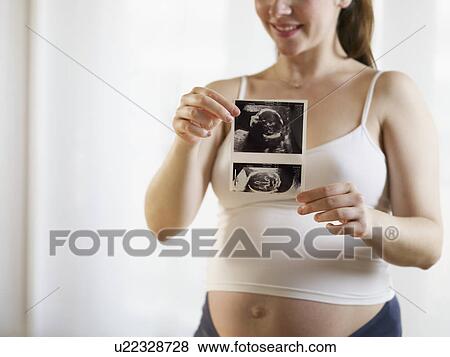 Pregnant woman View Large Photo Image Stock Photo - Pregnant woman. Fotosearch