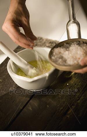 Stock Image - Preparing body peeling. Fotosearch