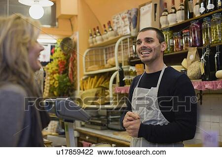 Stock Image - Sales conversation. Fotosearch