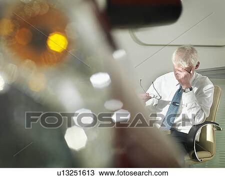 Salesman stressed or tired with car View Large Photo Image Stock Image - Salesman stressed or tired with car. Fotosearch