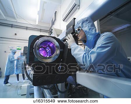 Scientist checking laser in laboratory View Large Photo Image Stock Photo - Scientist checking laser in laboratory. Fotosearch