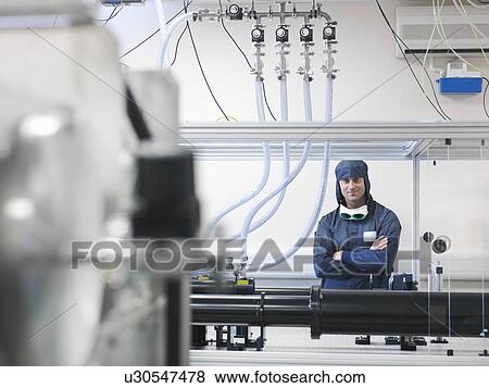 Scientist in laser laboratory View Large Photo Image Stock Photo - Scientist in laser laboratory. Fotosearch